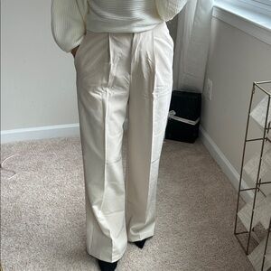 Ivory elastic band-wide leg pants. S